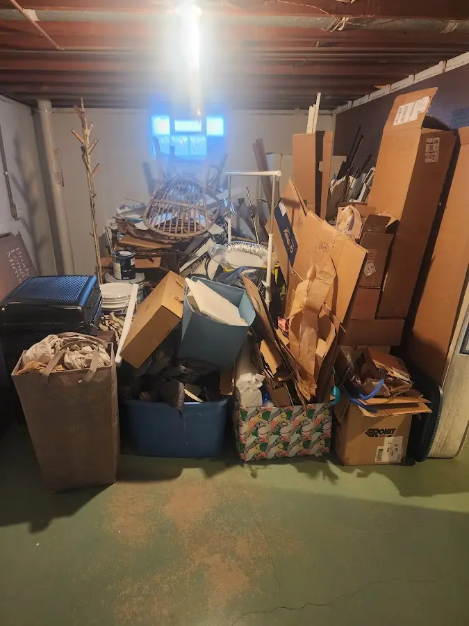 Roll-off dumpster container at job site for Yard Waste Dumpster Rental in Cozad